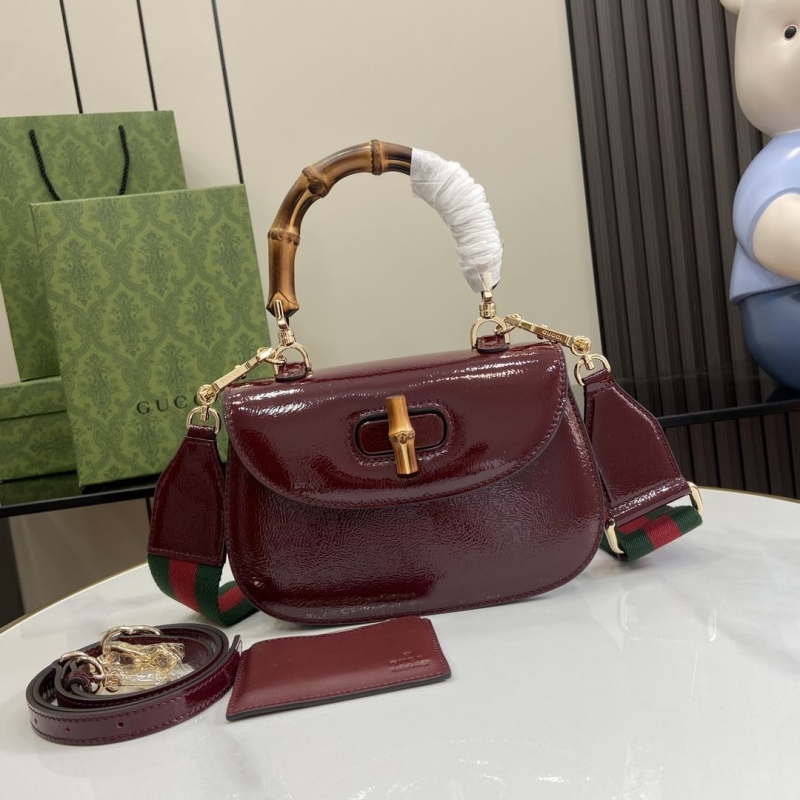 G*u*i top handle bags